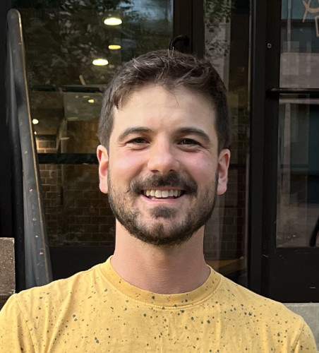 A headshot photo of Guilherme Gainett