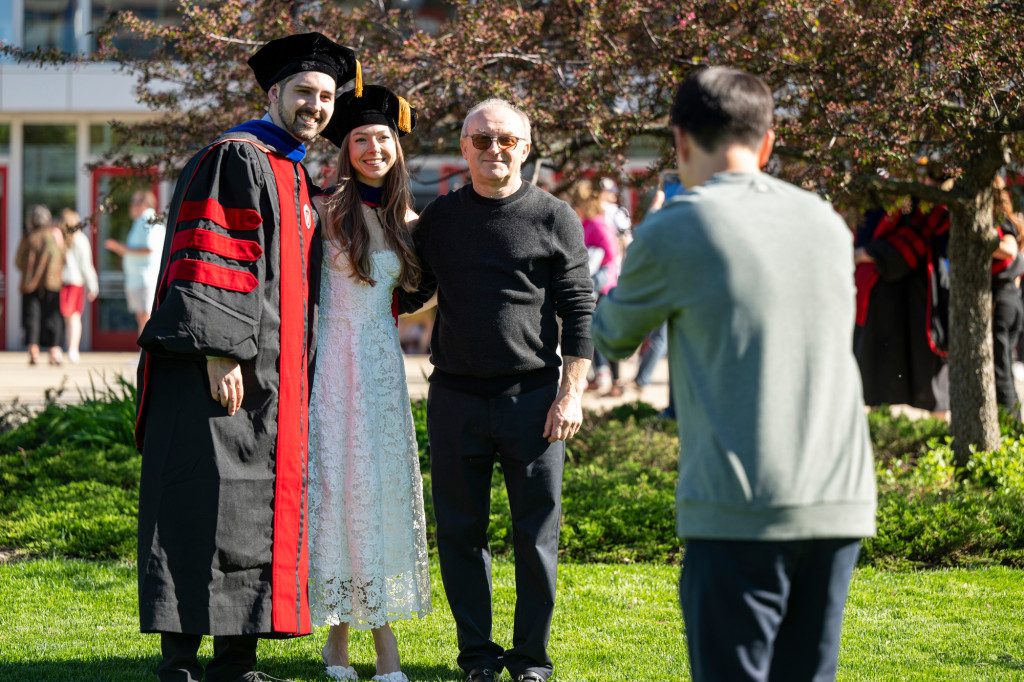 A group of people poses for a photo.