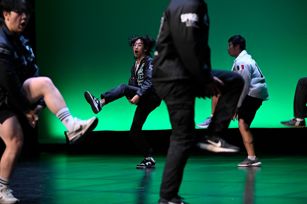 Members of the Delta Chapter of Chi Sigma Tau National Fraternity Inc. perform. 