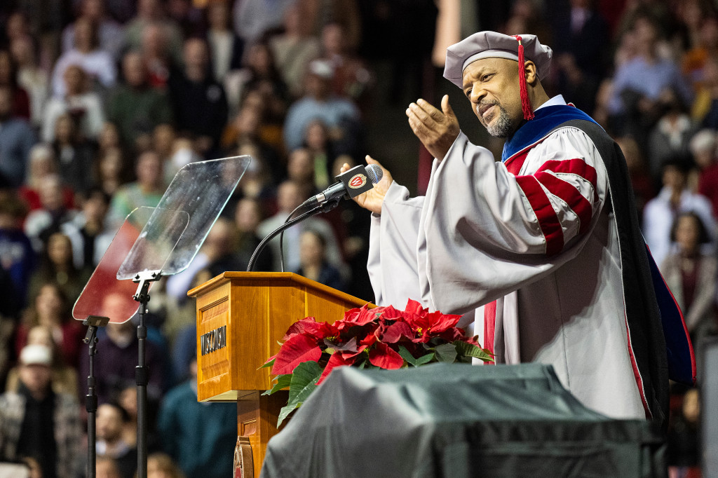 A man speaks on stage.