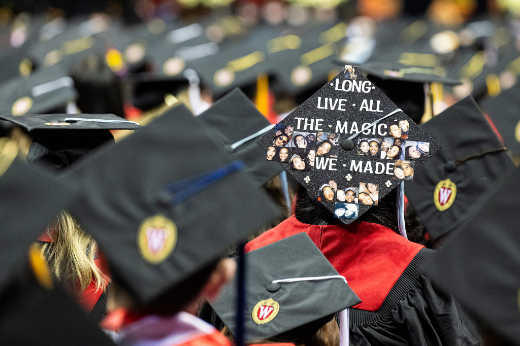 A commencement cap reads 